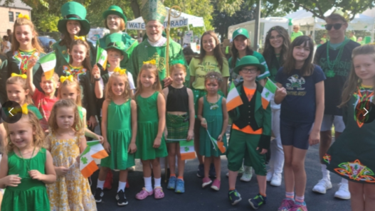 PICTURE OF KIDS DRESSED IN GREEN CLOTHES