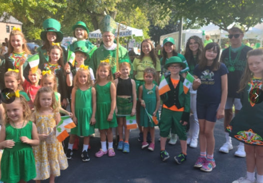 PICTURE OF KIDS DRESSED IN GREEN CLOTHES